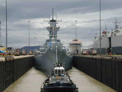 The Iowa Class Battleships are a tight fit throught the Canal.  Big J on her final transit of the Canal.  (October 18, 1999)